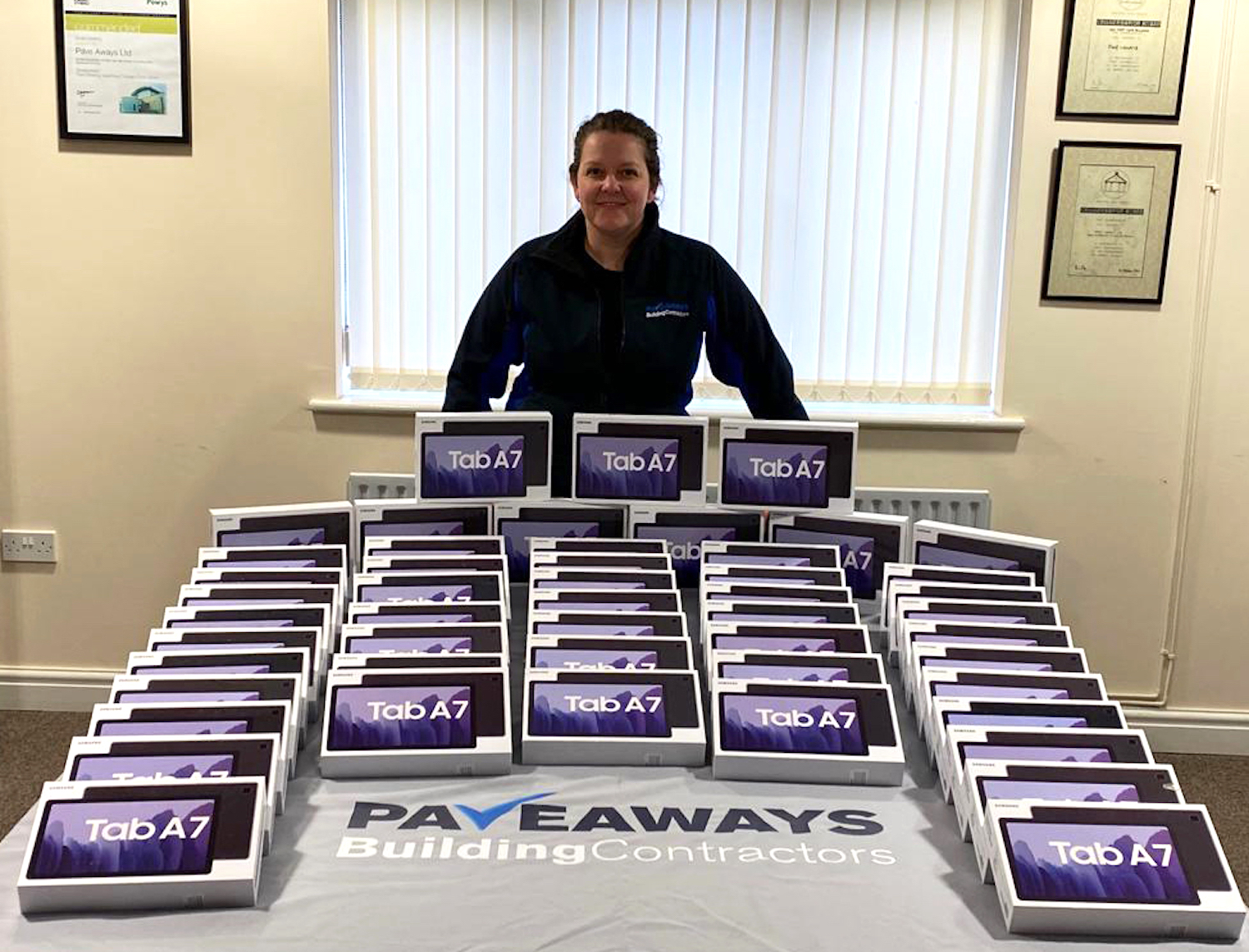 North and Mid Wales Building contractor donates tablets to schools