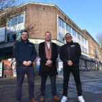 Swansea Council leader Rob Stewart, centre, with Kier Construction senior pre-construction manager Mark Miller, left, and Ministry of Furniture managing director Graham Hirst