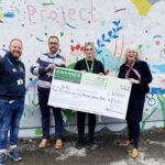 Sioned Jones (right), Area Manager Swansea Building Society West Wales, hands over a cheque for £2,500 to representatives of Carmarthen Youth Project, Dr Mz