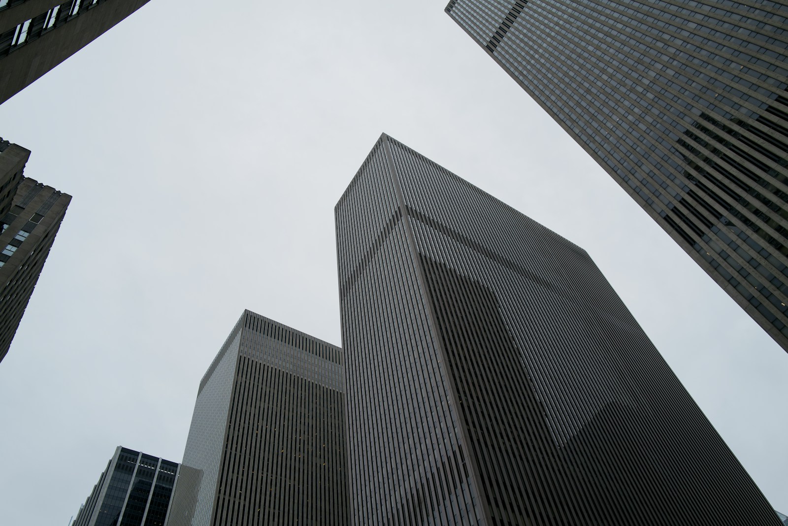 Looking up at tall buildings in a city